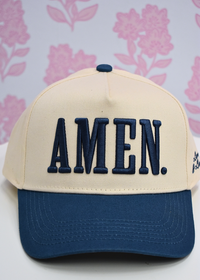 Adjustable snapback closure on AMEN slate blue trucker hat
