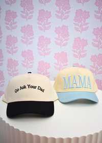 Adjustable snapback closure on baby blue MAMA and Go Ask Your Dad vintage trucker hat