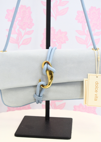 Suede shoulder bag with hook closure and compact shape
