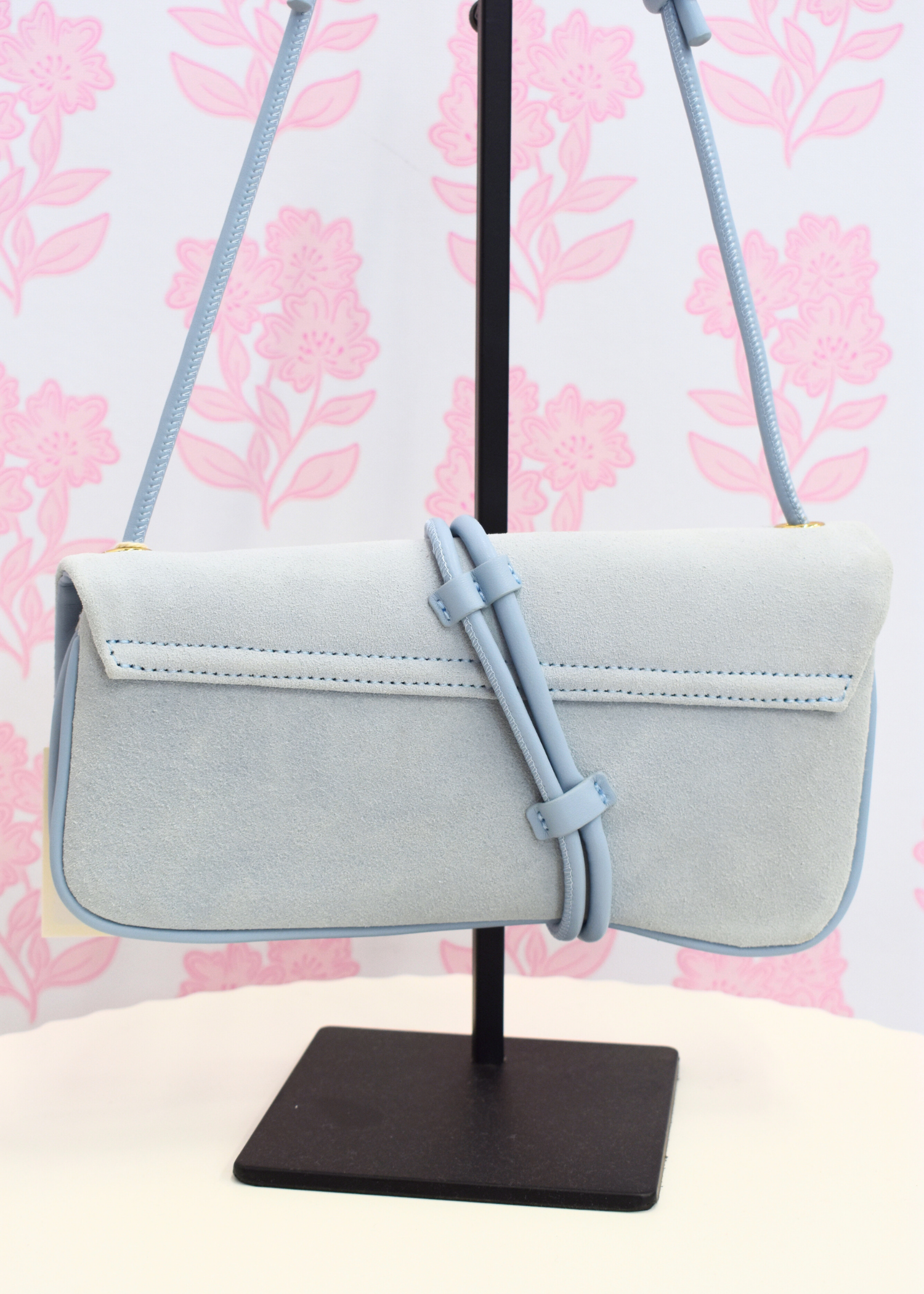 Modern suede shoulder bag styled for everyday wear