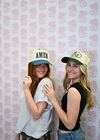 Front view of AMEN slate blue vintage trucker hat with embroidered design