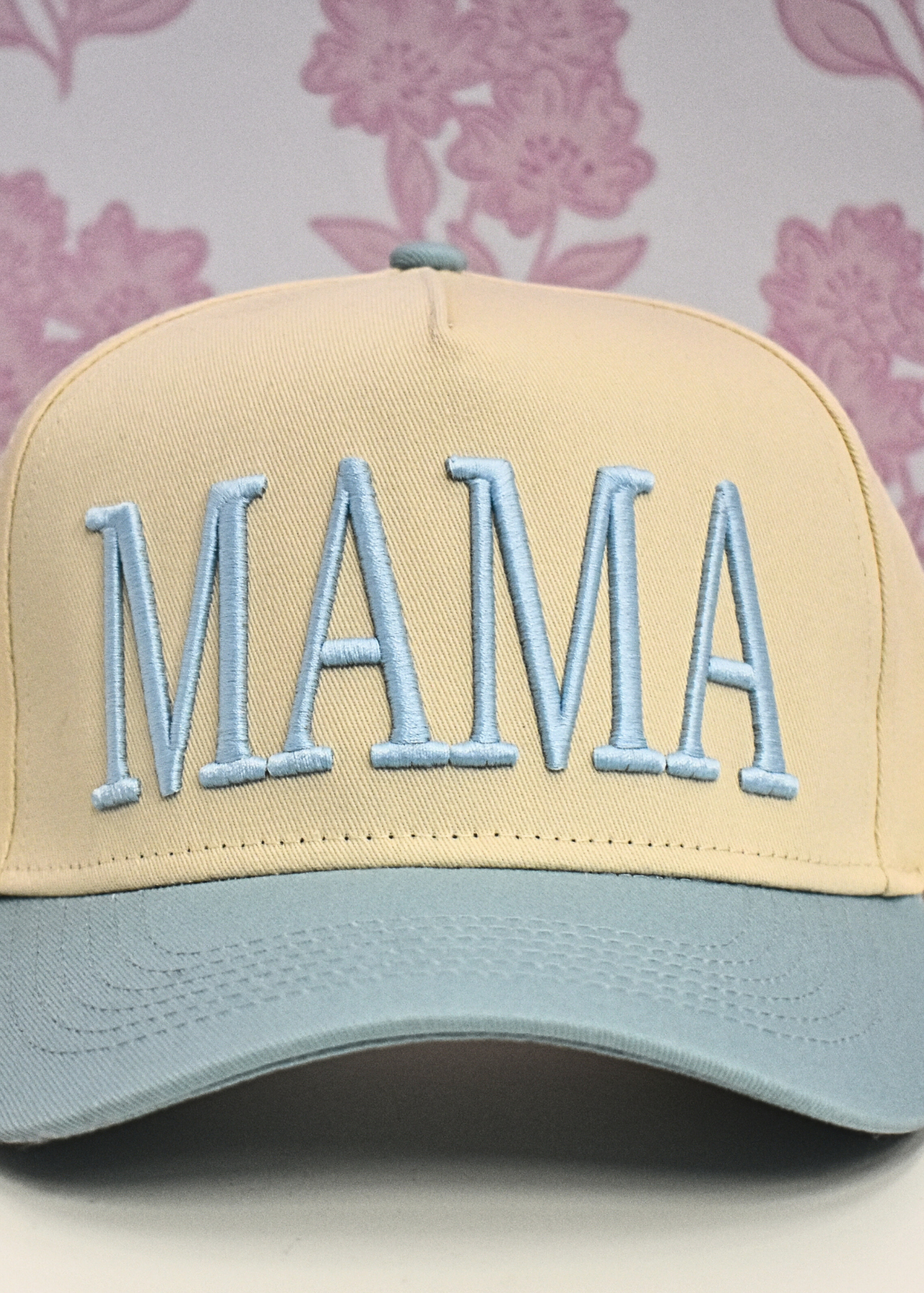 Detail view of baby blue vintage trucker hat for moms