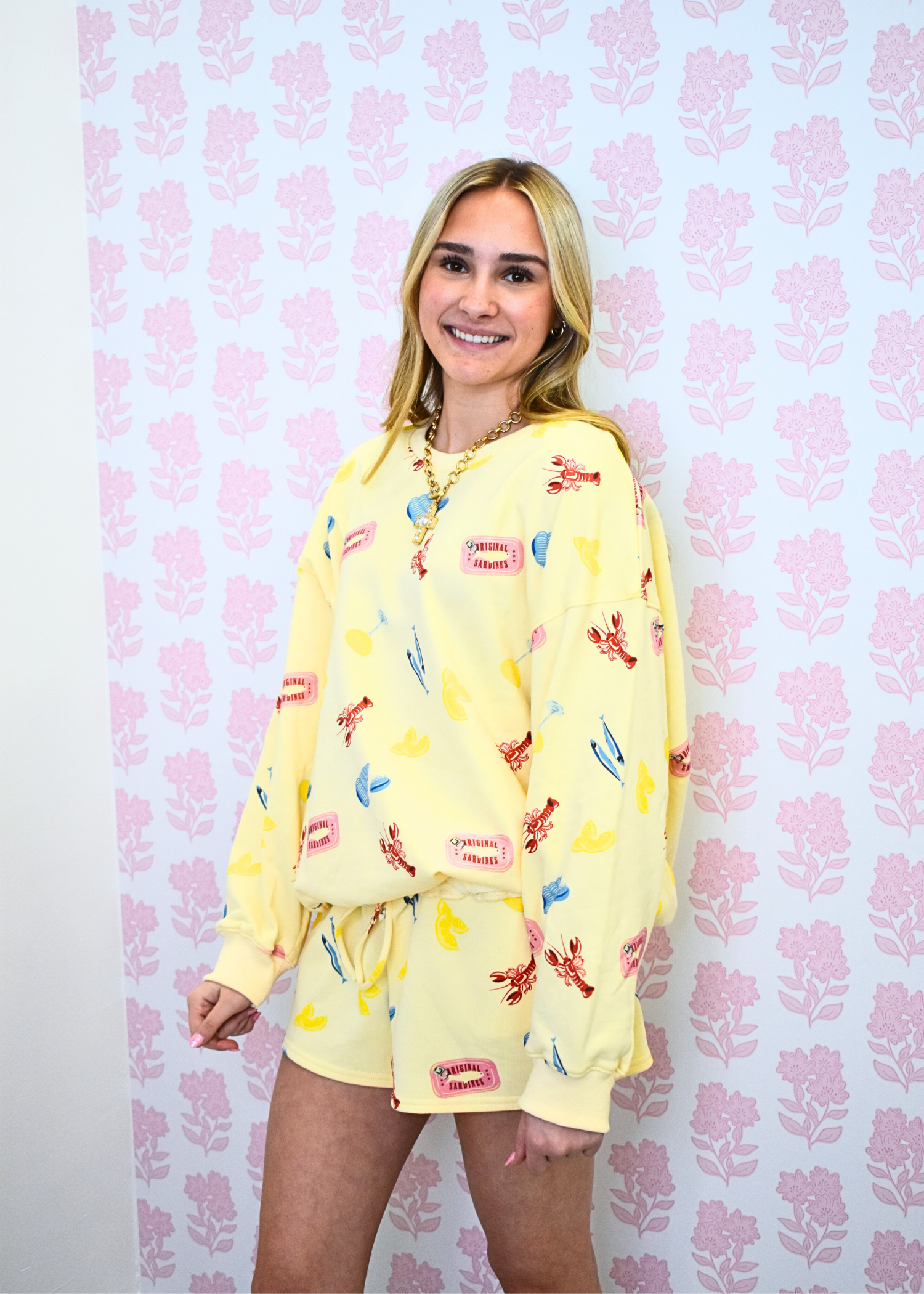 Close up of lobster graphic on Sunny Lobster sweatshirt