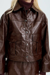 Chocolate plum jacket featuring flattering fit and clean design