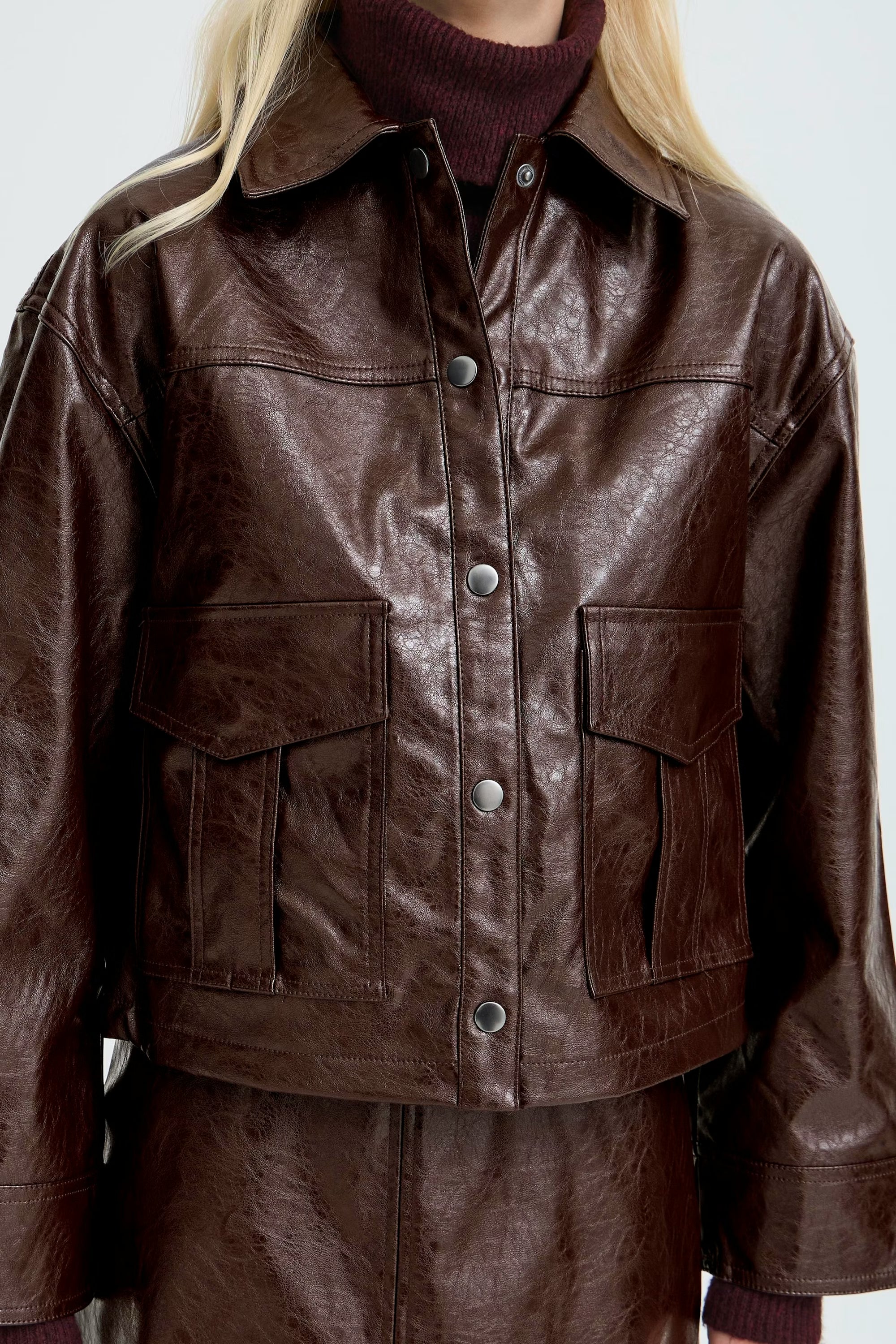 Chocolate plum jacket featuring flattering fit and clean design
