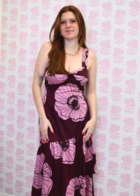 Sleeveless violet floral dress with flowing tiered design