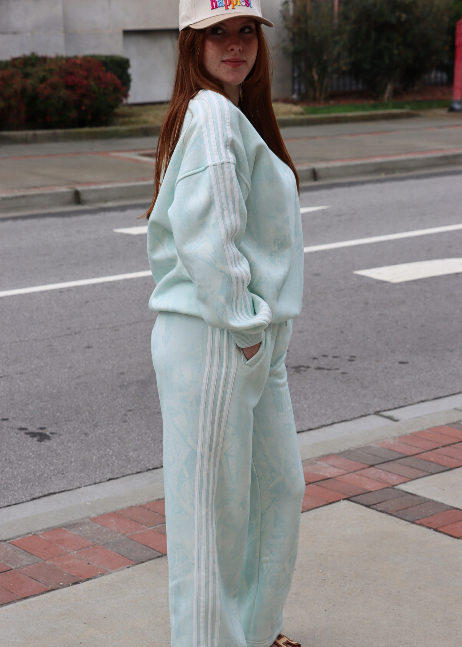 Mint camo sweatpants styled with casual athleisure outfit