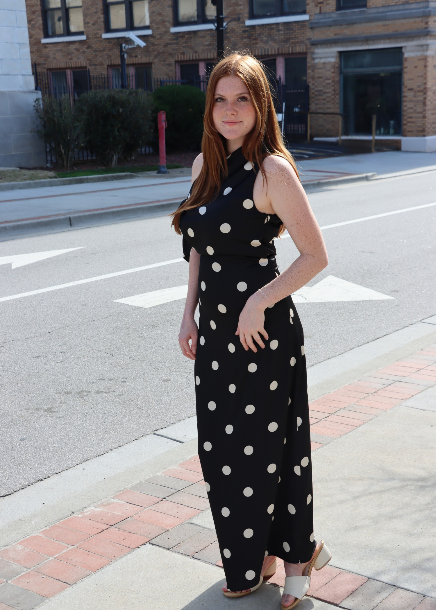 Black polka dot satin bias dress styled for date night outfit