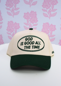 Women’s green Christian trucker hat with God is Good slogan
