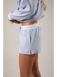 Side view of women’s cotton blend striped mid rise lounge shorts