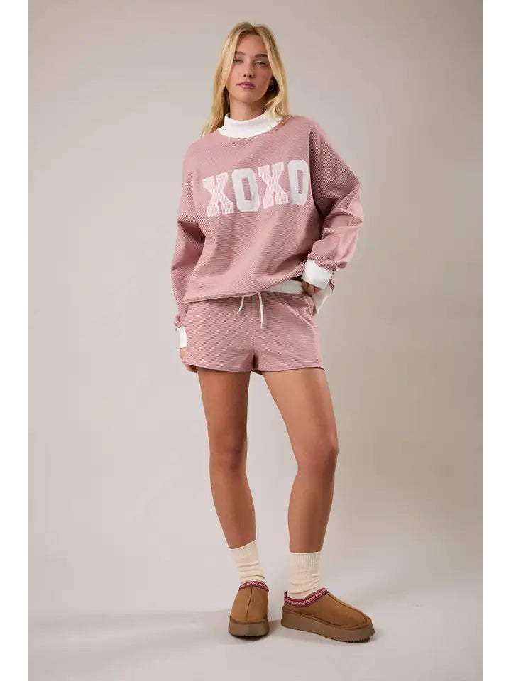 Soft red and cream striped shorts designed for cozy outfits