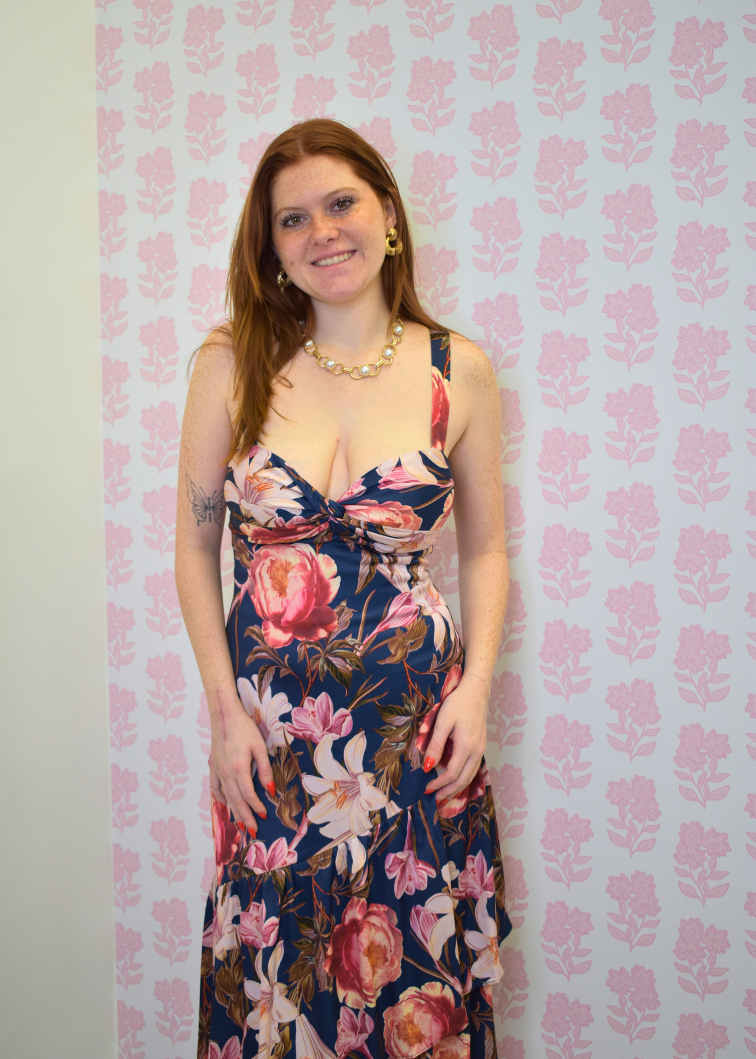 Navy floral ruffled tiered midi dress with sleeveless design