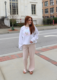 Club Doodle embroidered sweatshirt styled with striped lounge pants