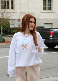 Club Doodle embroidered sweatshirt styled with casual outfit