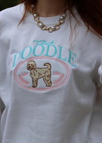 Embroidered doodle dog sweatshirt