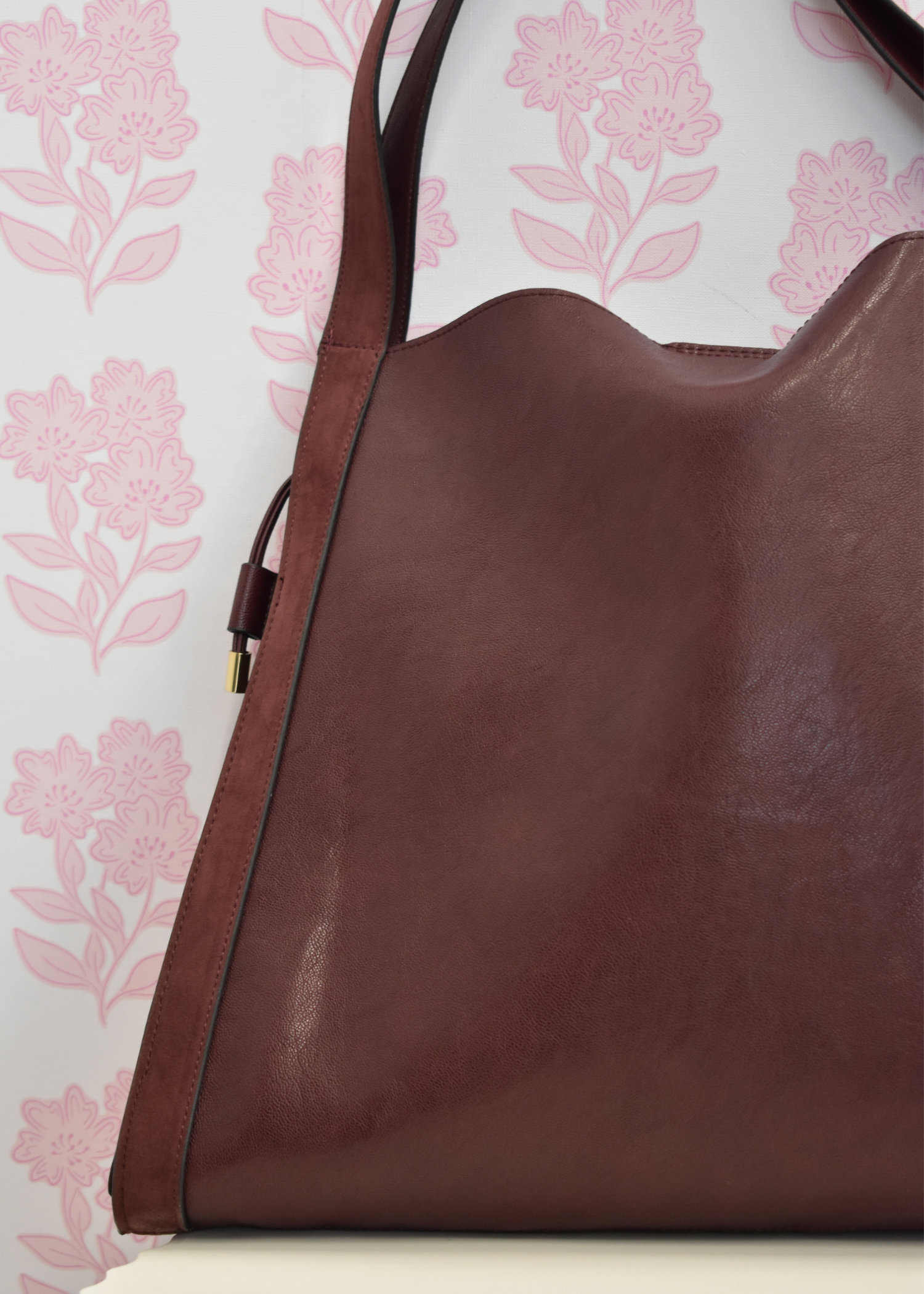 Fallon burgundy shoulder bag styled with outfit