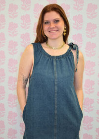 Farrah denim shift dress featuring feminine shirred neckline detail