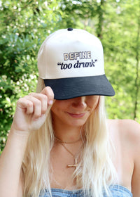 Black and natural snapback trucker hat with Define Too Drunk embroidery
