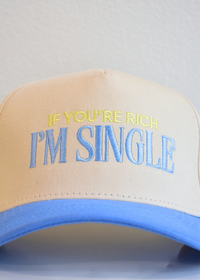 Periwinkle and natural snapback hat reading If You’re Rich I’m Single