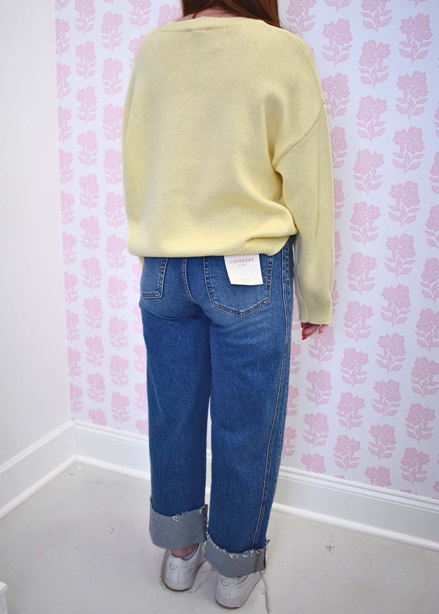 High rise barrel style jeans featuring distressed cuffed bottoms