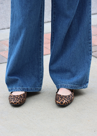 Dark wash high rise wide leg denim pants styled with matching top