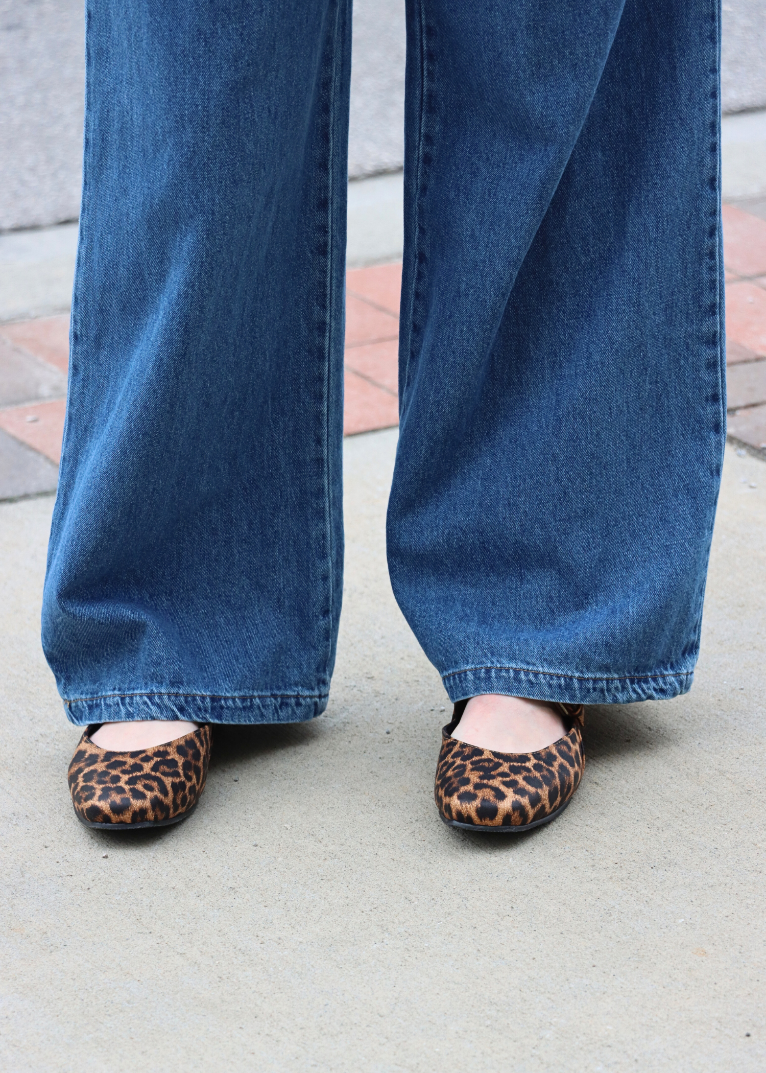 Dark wash high rise wide leg denim pants styled with matching top