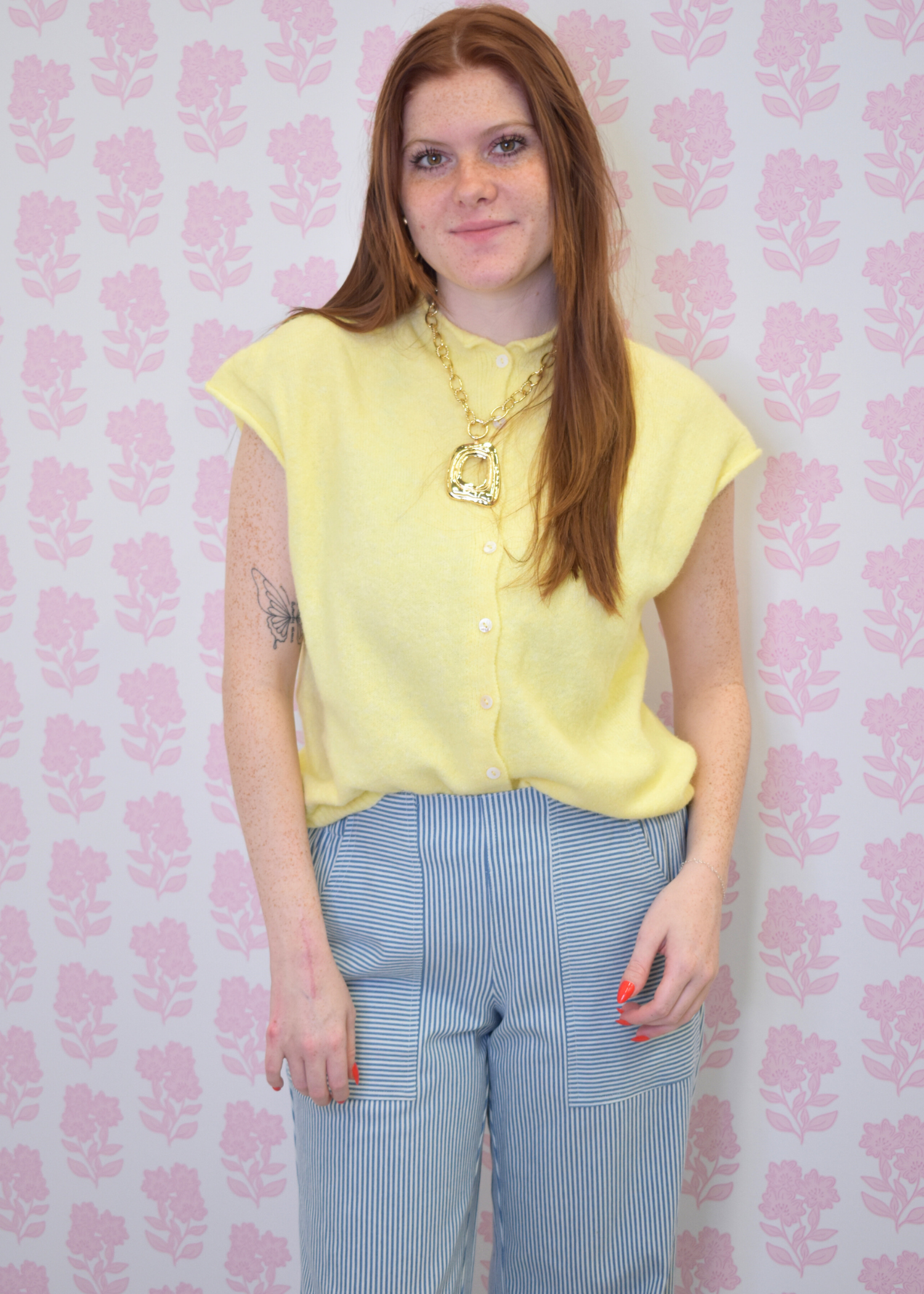 Butter yellow sweater vest cardigan with soft knit texture