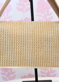 Close Up view of ivory shoulder bag with slip and zipper pockets