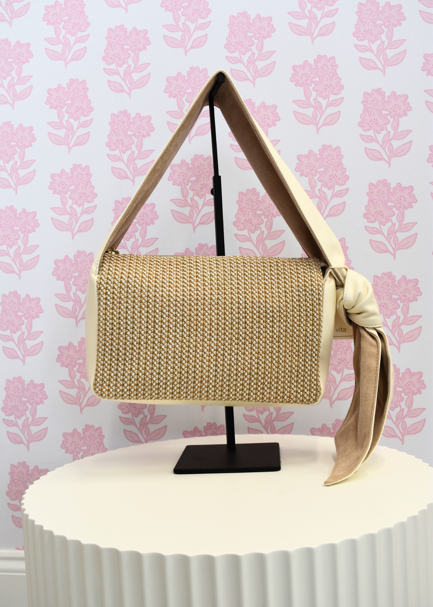 Ivory shoulder bag with faux leather and raffia design