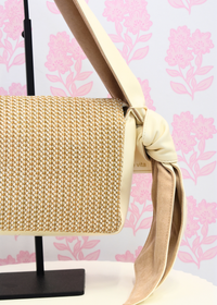 Lucie ivory shoulder bag featuring zipper closure and structured shape