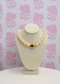 Ivory marble stone necklace styled for everyday wear