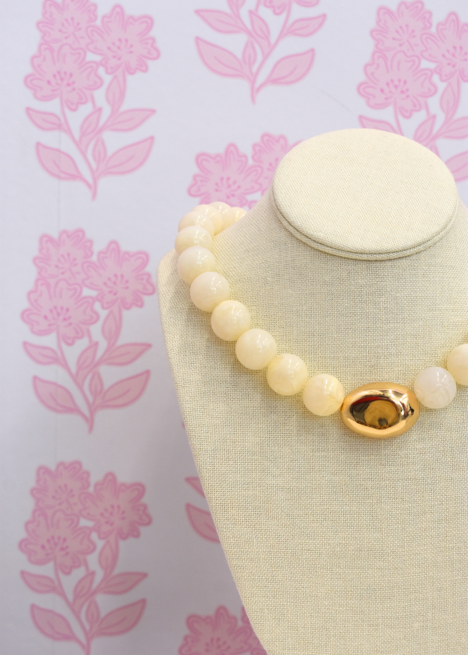 Organic style necklace featuring polished ivory marble stone