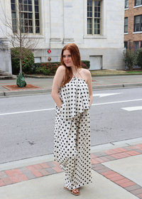 Front view of Palm Coast polka dot linen halter top with tie front detail