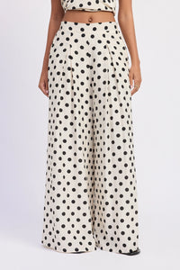 Palm Coast polka dot linen pants paired with matching halter top set