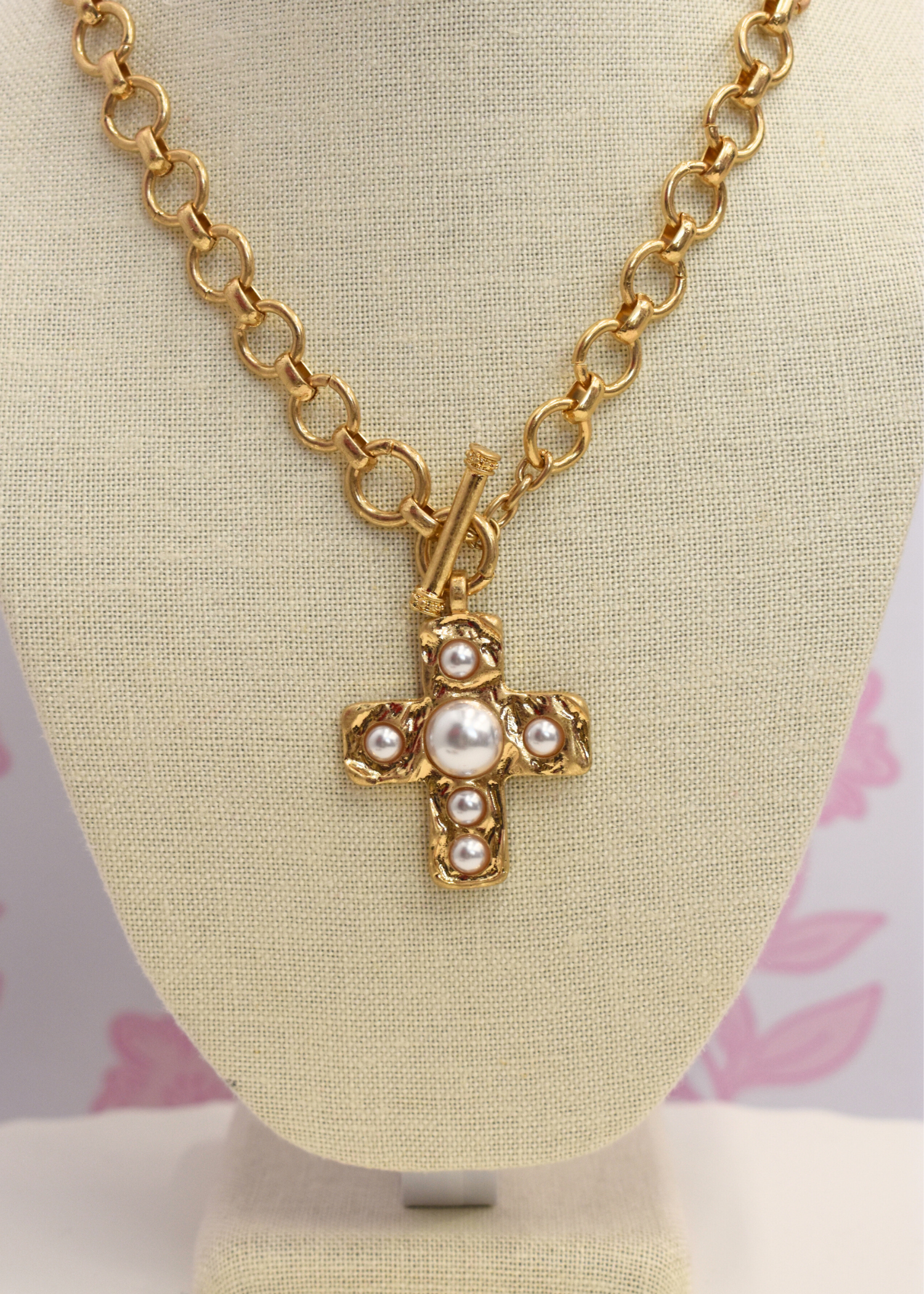 Pearl cross necklace and stud earrings set styled for everyday wear