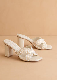 Close up of pearl embroidery on raffia upper block heel