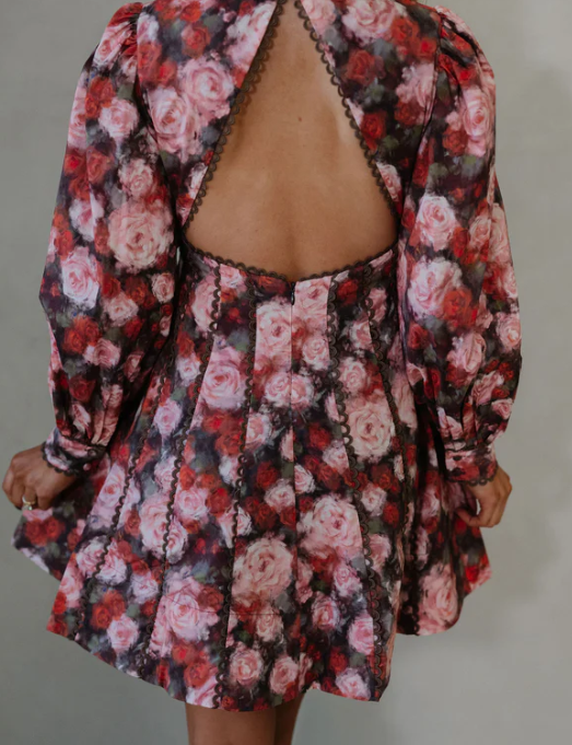 Statement floral mini dress with elegant silhouette and open back