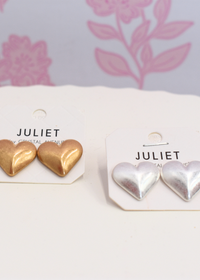 Vintage style puffy heart earrings styled for everyday wear in gold and silver