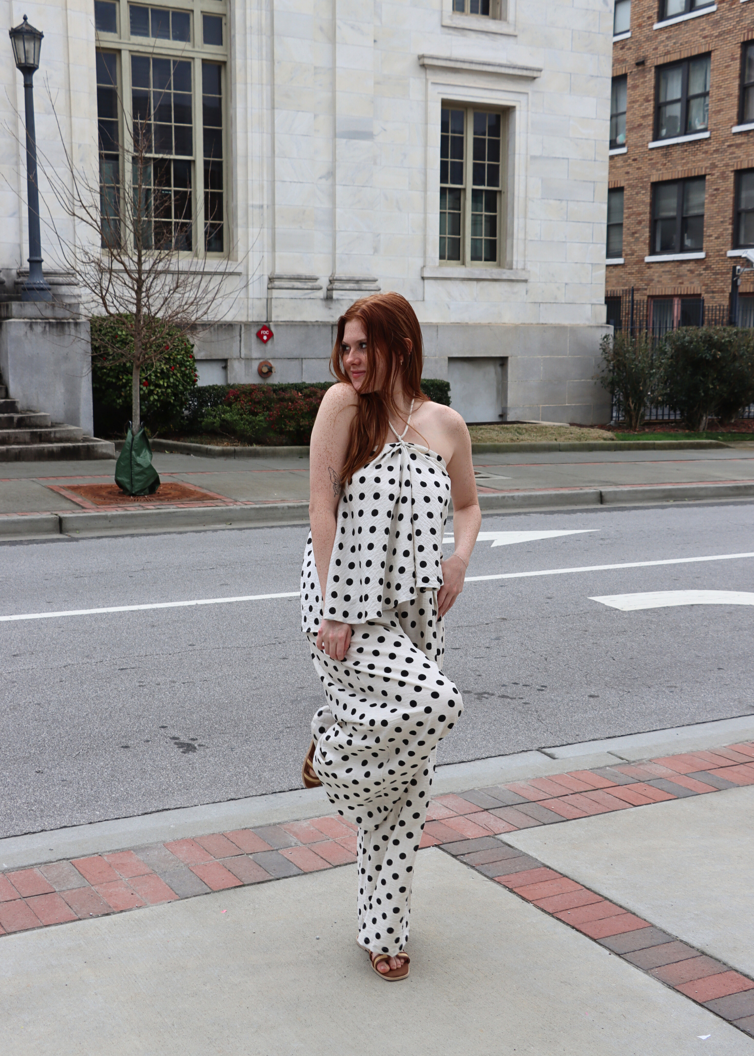 Polka dot linen halter top with wide leg pants styled as resort wear outfit