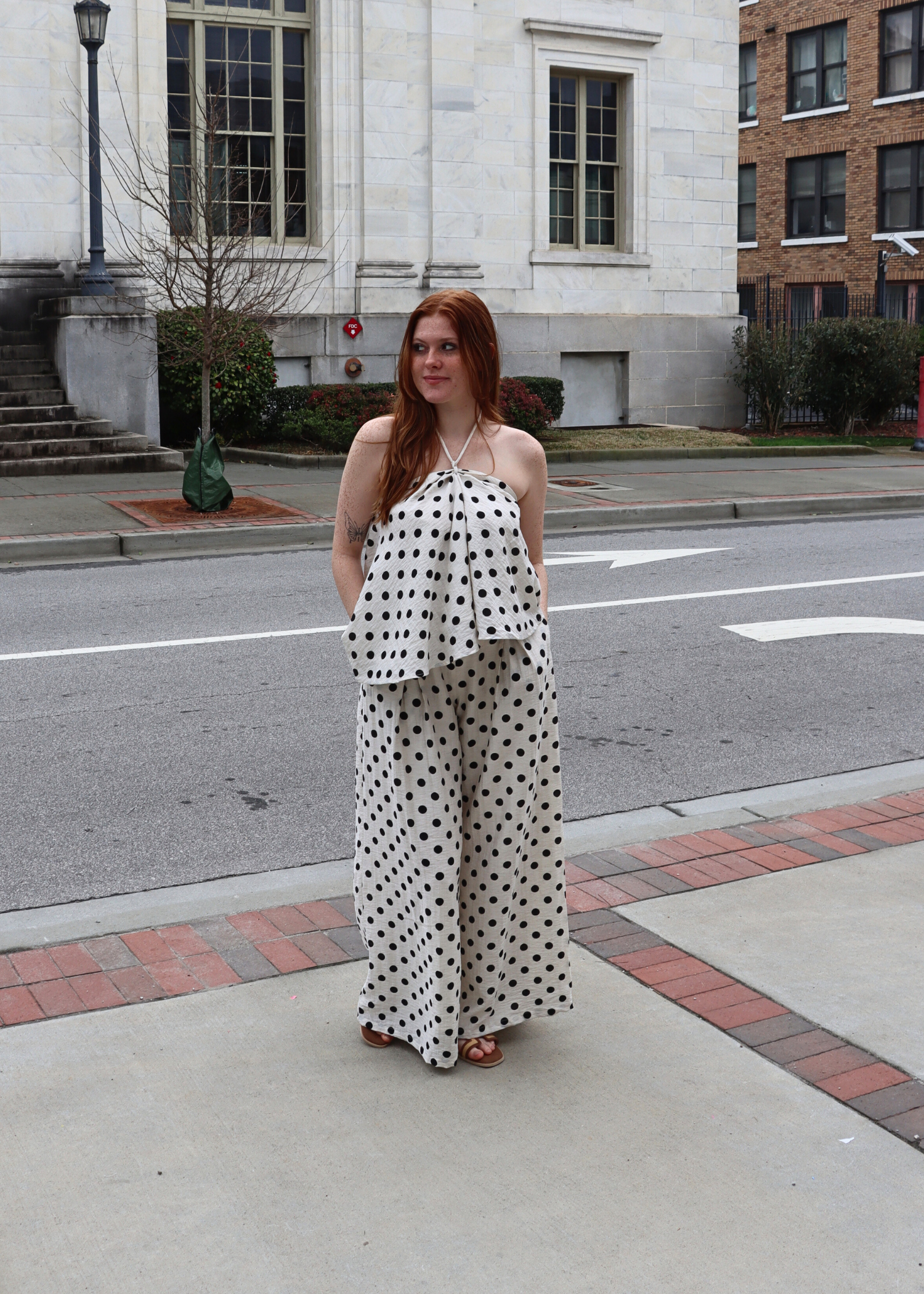 Polka dot linen halter top styled as resort wear outfit