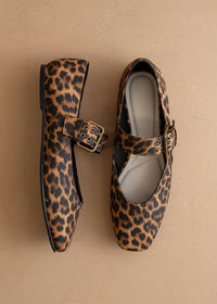 Front view of Soho leopard ballet flat with studded buckle strap