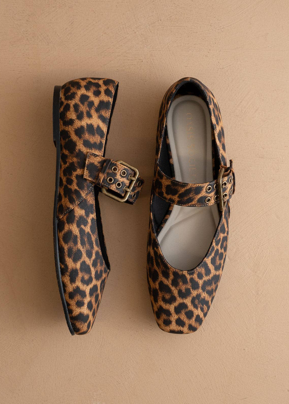 Front view of Soho leopard ballet flat with studded buckle strap
