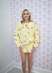 Front view of Sunny Lobster graphic sweatshirt for women