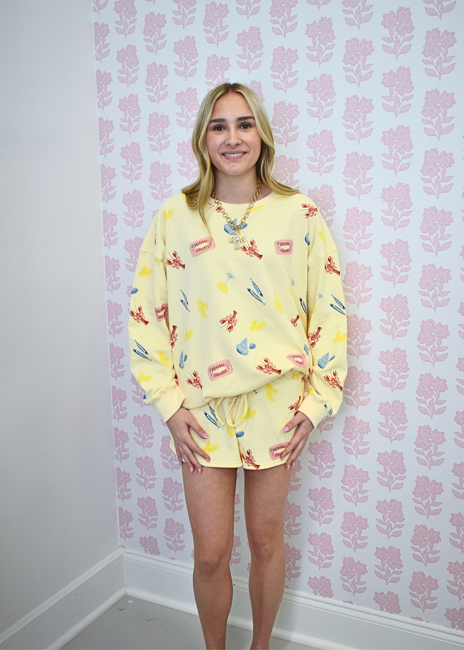 Front view of Sunny Lobster graphic sweatshirt for women