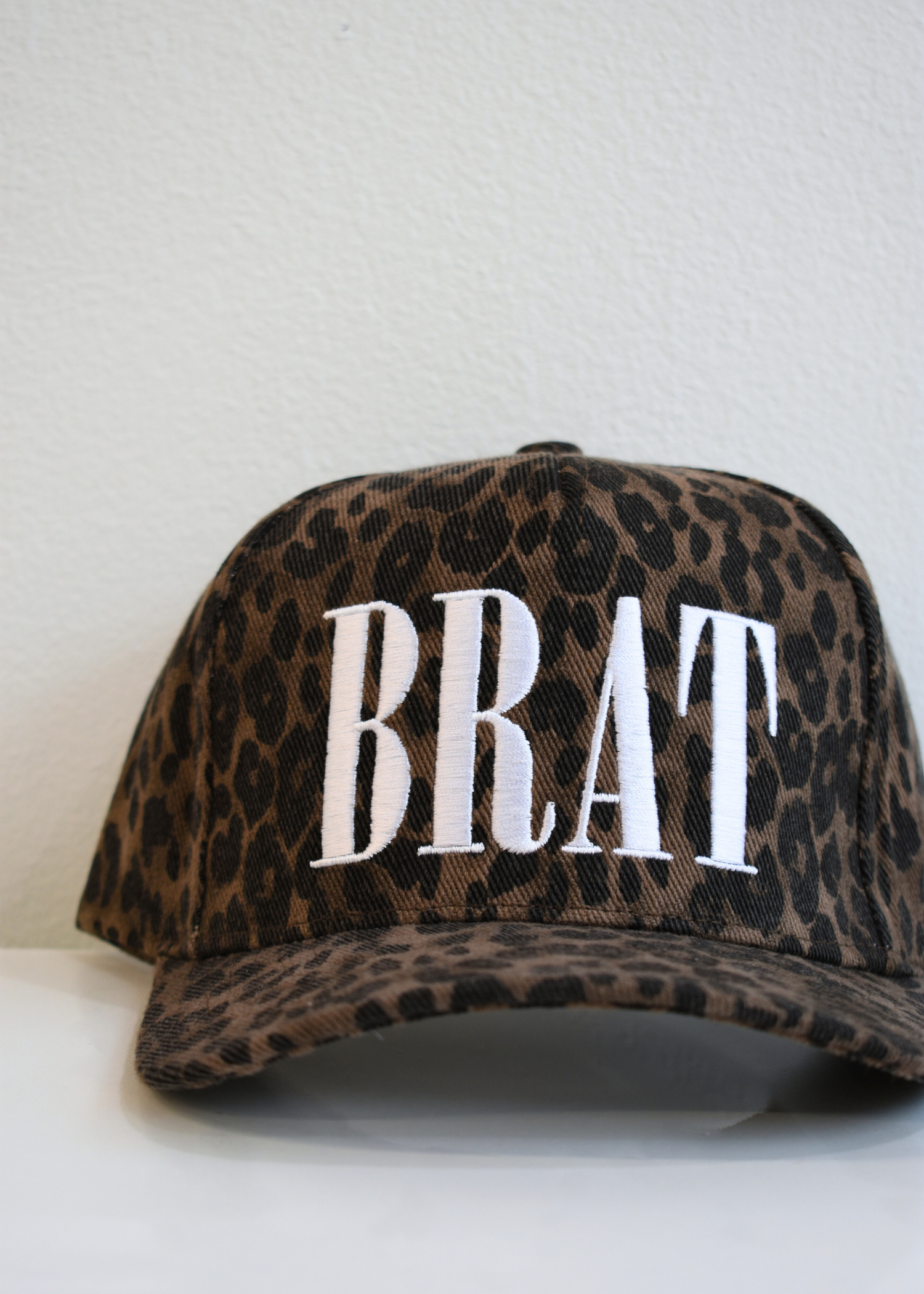 Leopard BRAT trucker hat styled with casual street style outfit