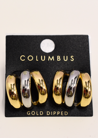 Gold and silver hoop earrings with layered design detail