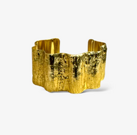 Gold wave cuff bracelet with sculptural design