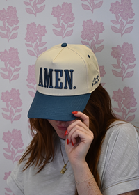 Side view of slate blue AMEN vintage trucker hat