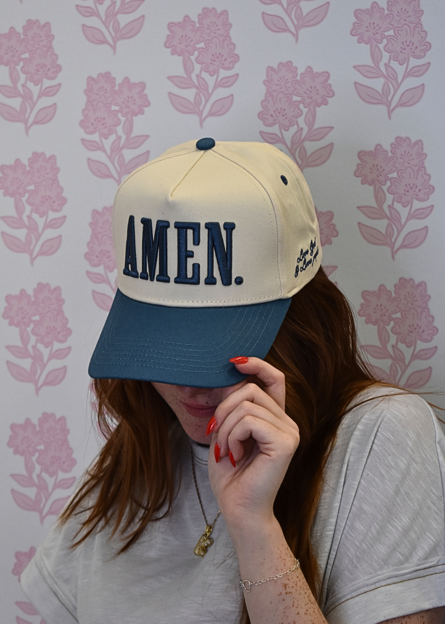 Side view of slate blue AMEN vintage trucker hat
