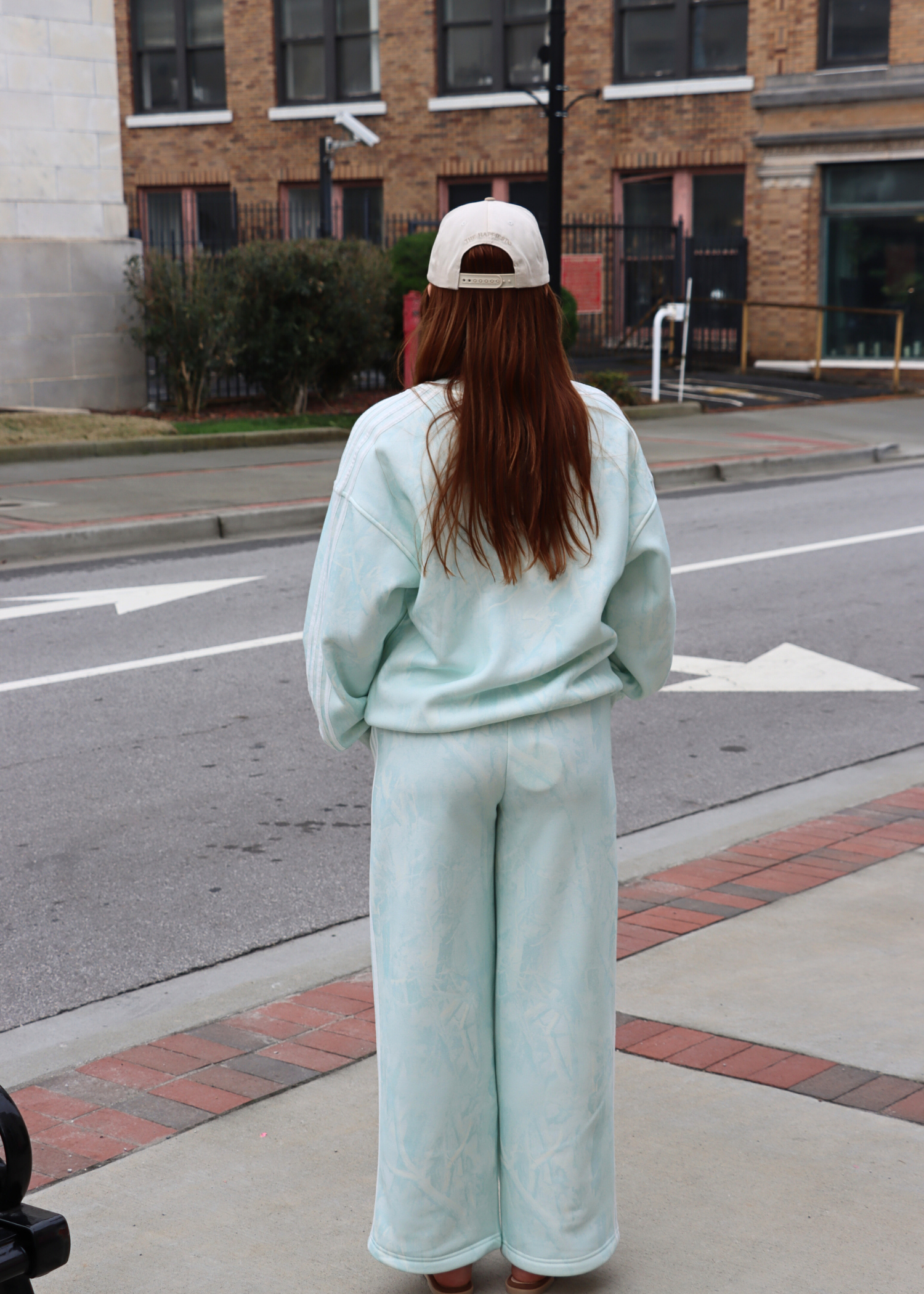 Back view of mint camo jogger sweatpants for women
